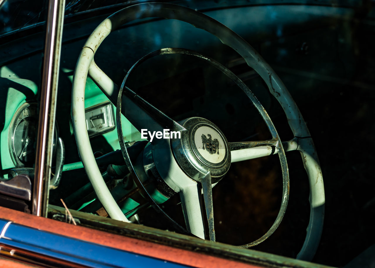 Close-up of old-fashioned steering wheel