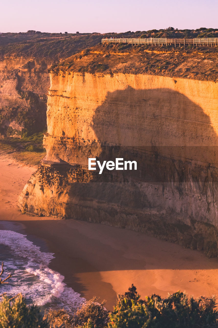 SCENIC VIEW OF ROCK FORMATIONS AT SEASIDE