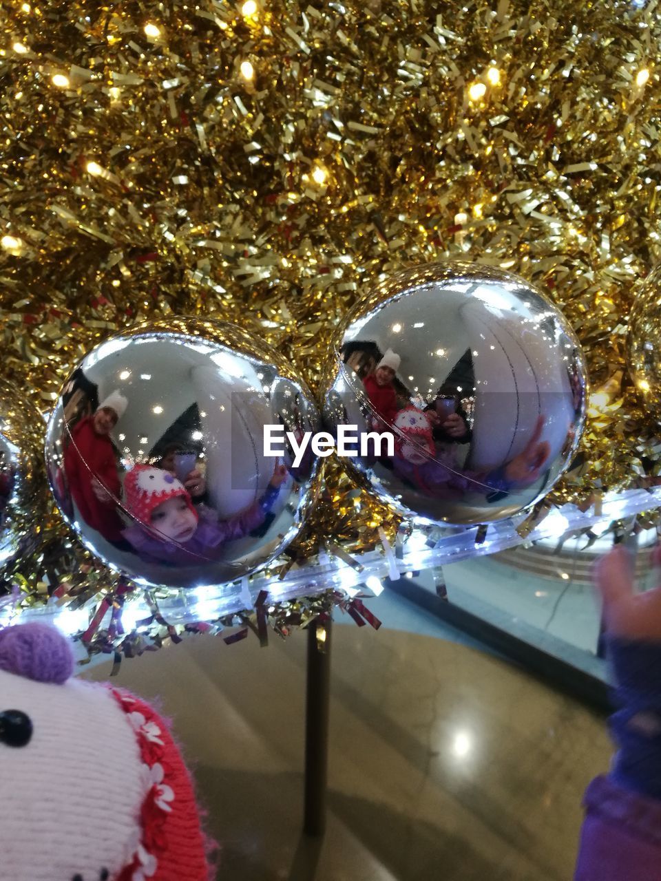 CLOSE-UP OF ILLUMINATED LIGHT BULB HANGING ON CHRISTMAS TREE