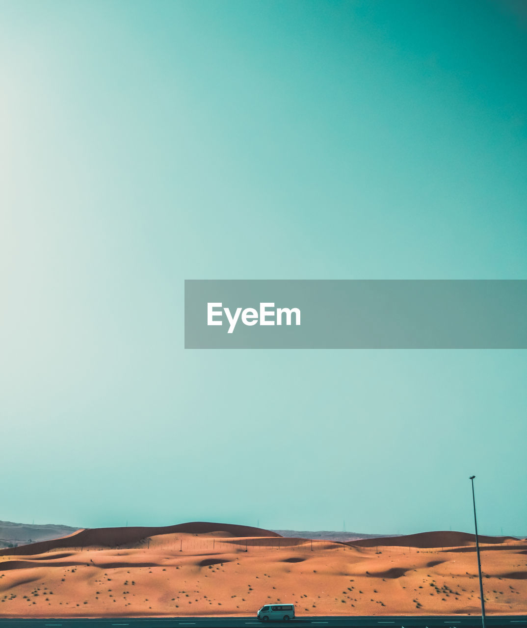 Scenic view of desert against clear sky