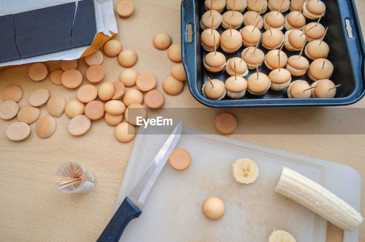 High angle view of biscuits on cutting board