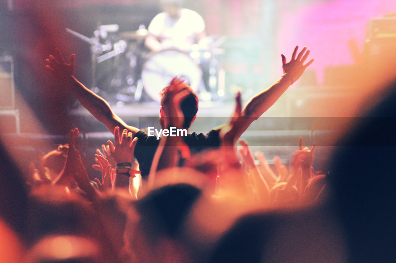 Crowd enjoying at music concert