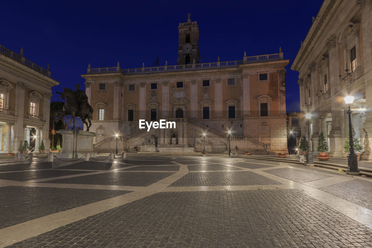 ILLUMINATED BUILDING AT NIGHT