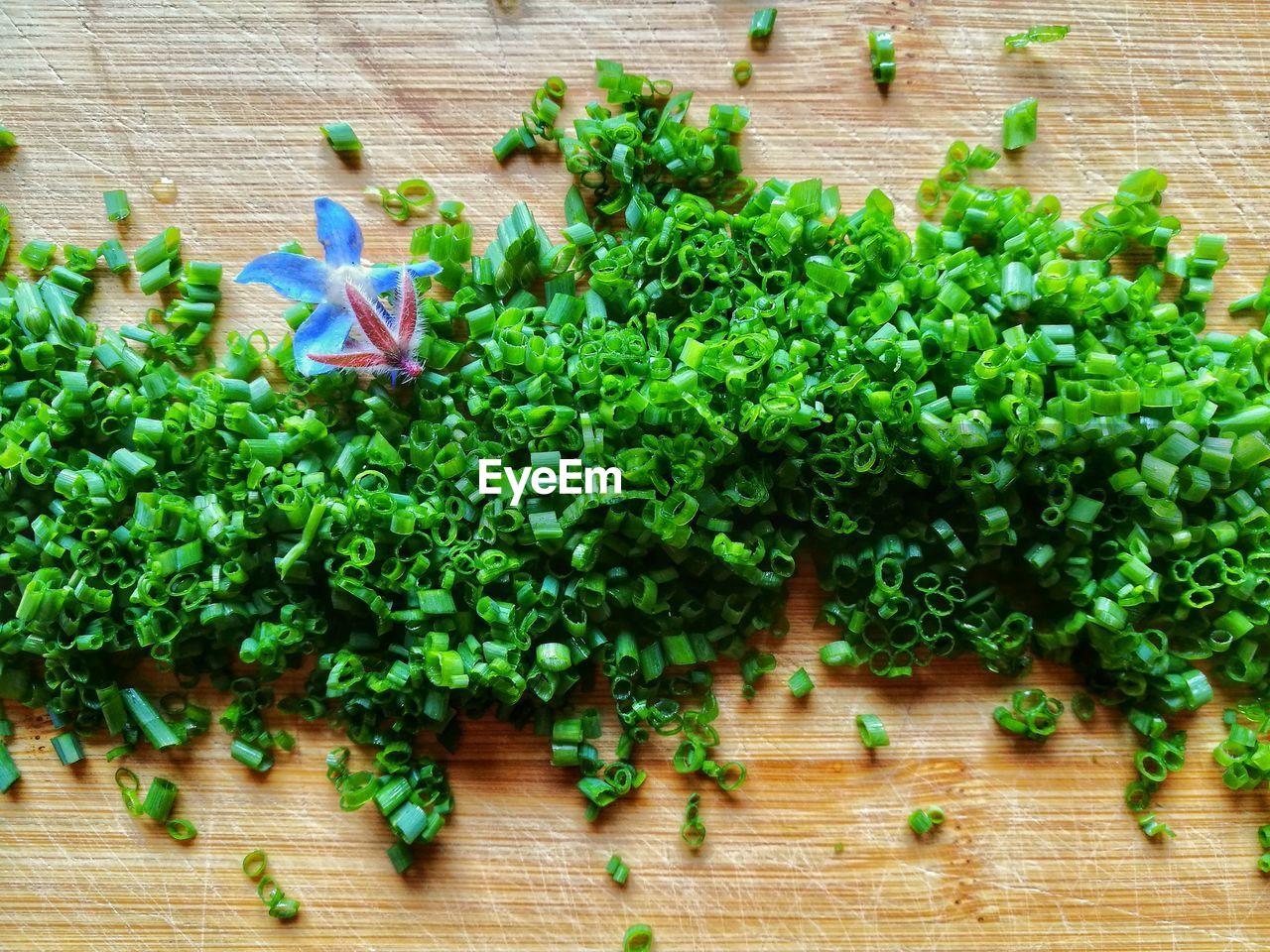 CLOSE-UP OF VEGETABLES ON WOODEN TABLE