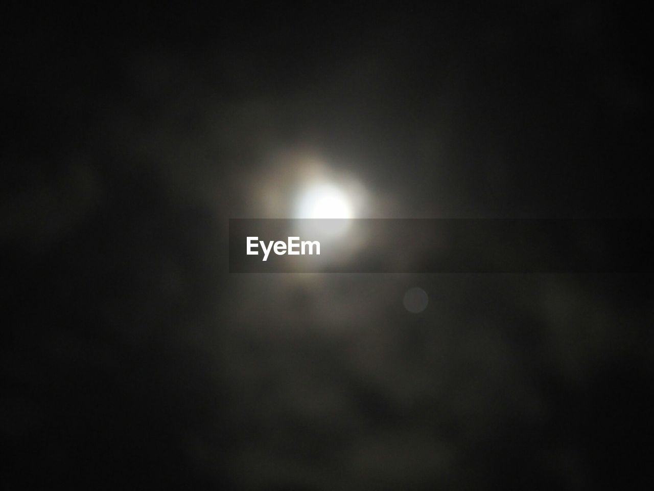 LOW ANGLE VIEW OF MOON AGAINST SKY AT NIGHT