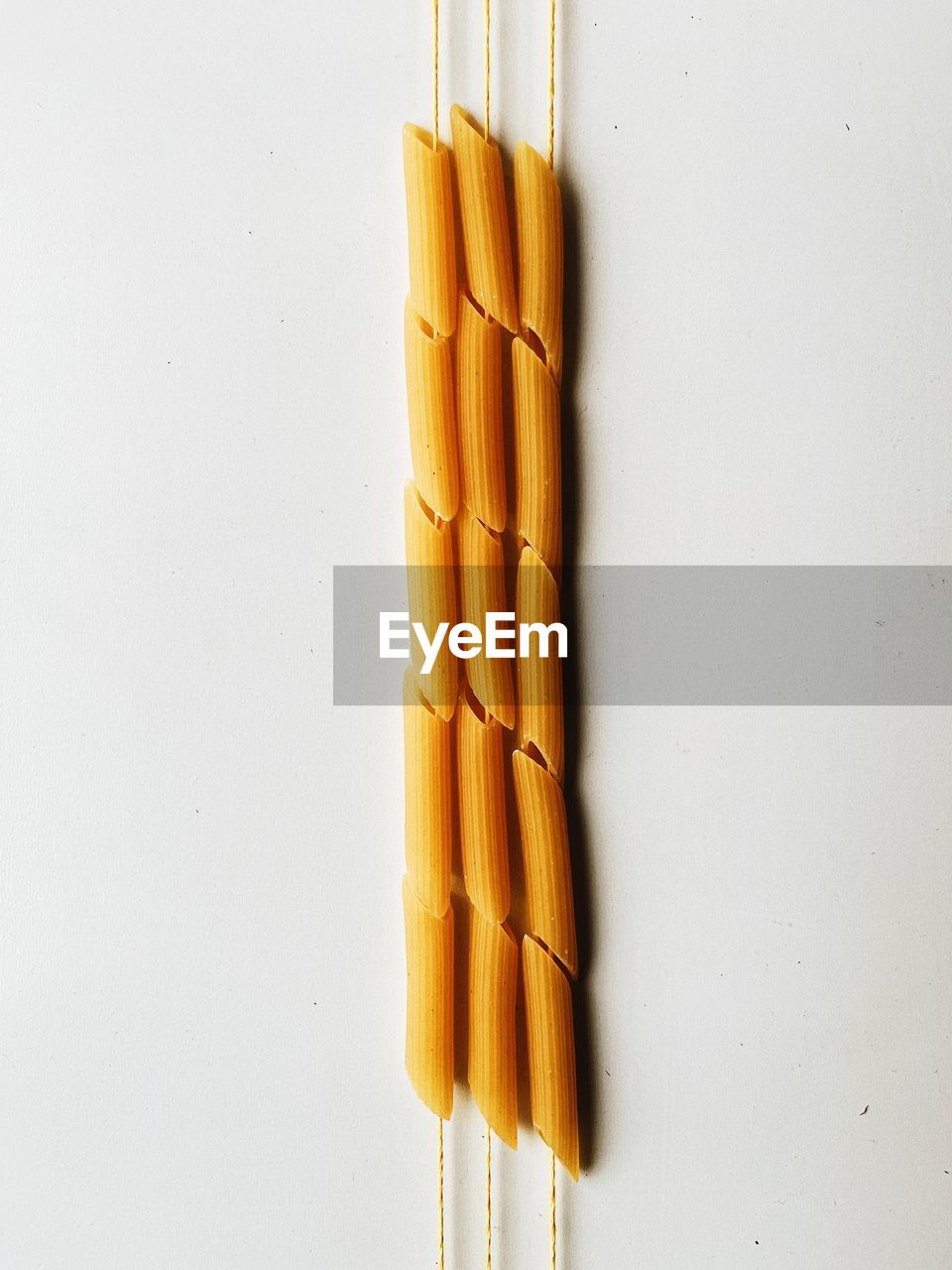 High angle view of pasta on white background