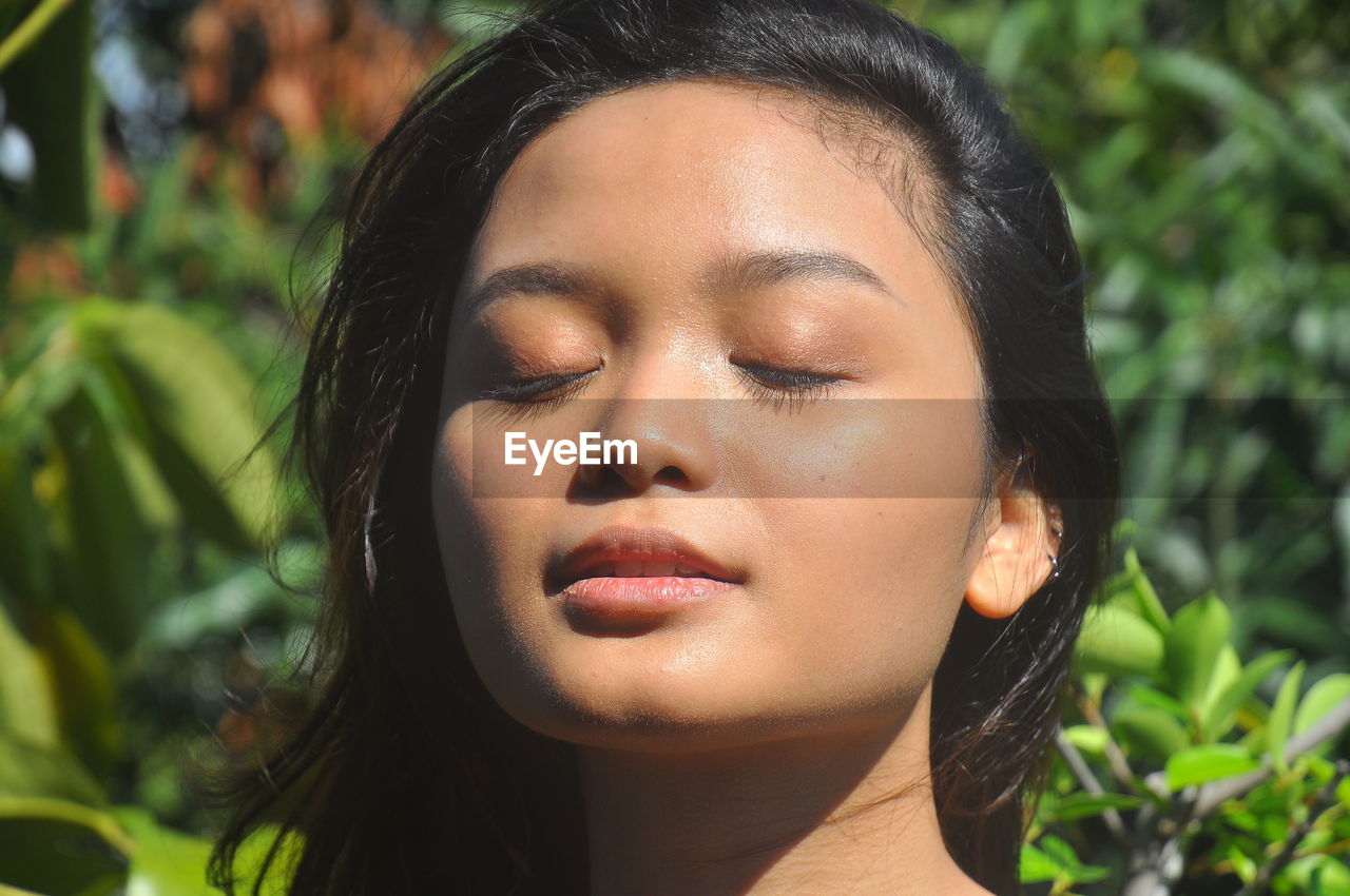 Close-up portrait of a beautiful young woman