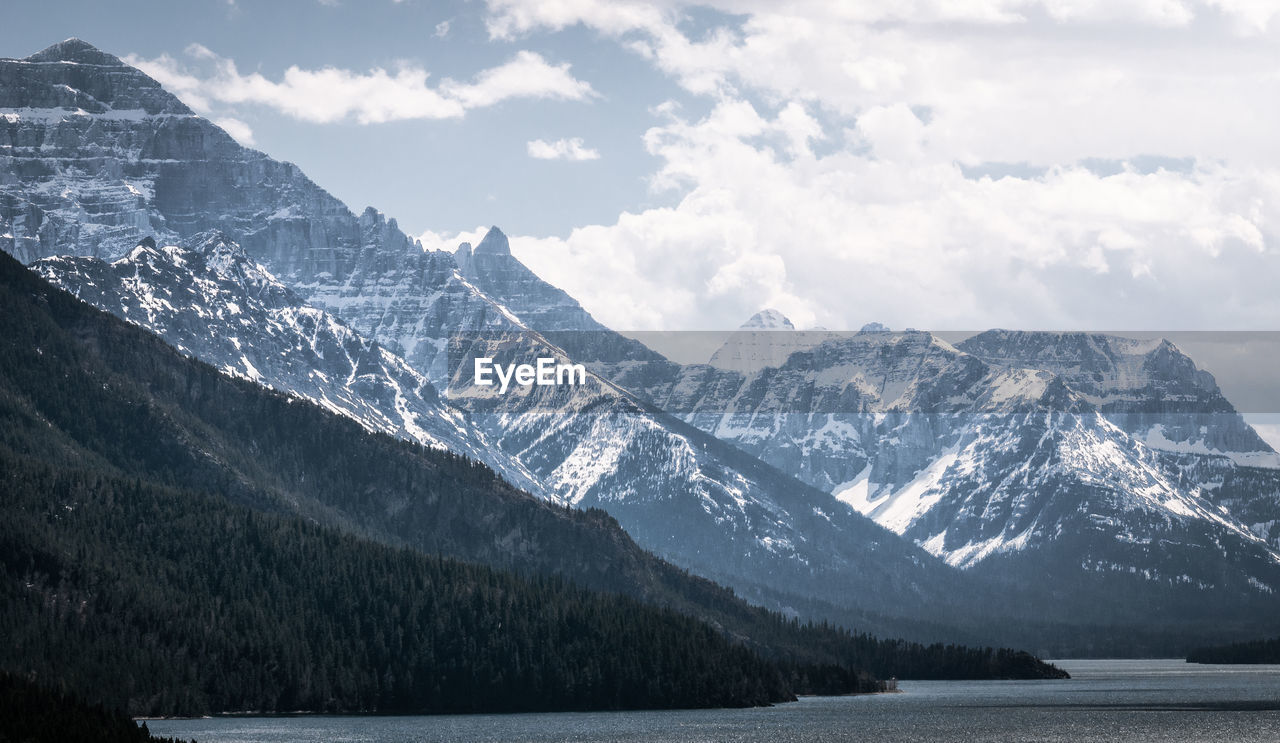 Forests, lake and big mountain range, shot in waterton national park, alberta, canada