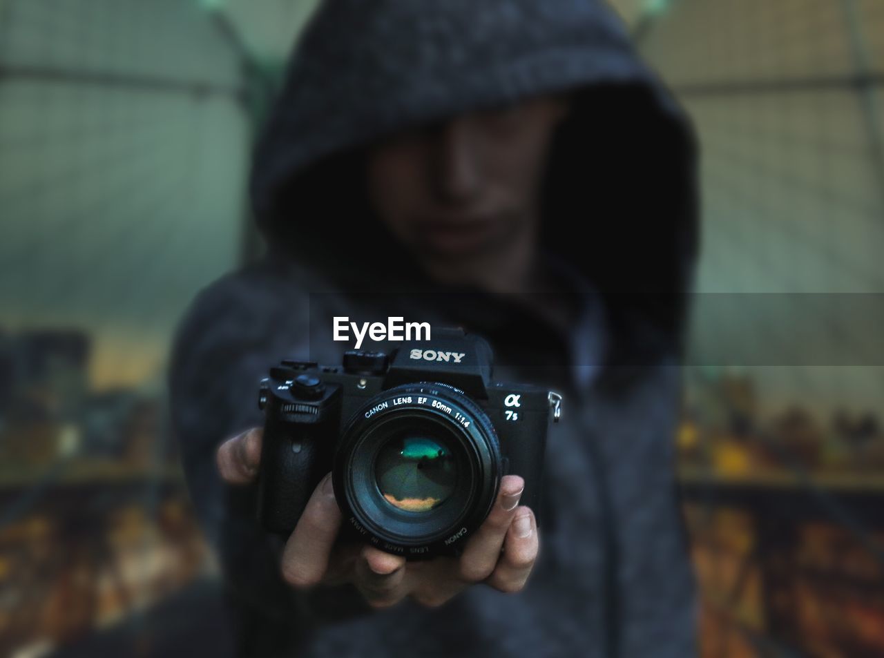 MIDSECTION OF MAN PHOTOGRAPHING