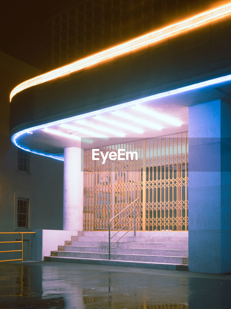 LOW ANGLE VIEW OF ILLUMINATED LIGHTS ON BUILDING