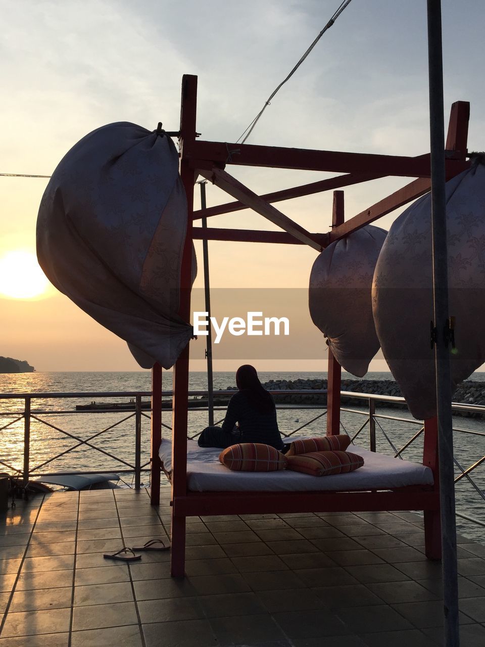 MAN LOOKING AT SEA VIEW