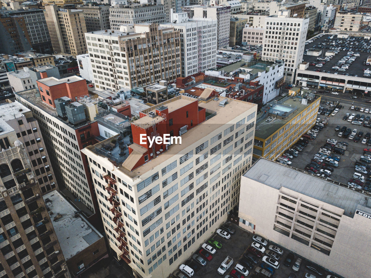 HIGH ANGLE VIEW OF BUILDINGS AND STREET IN CITY