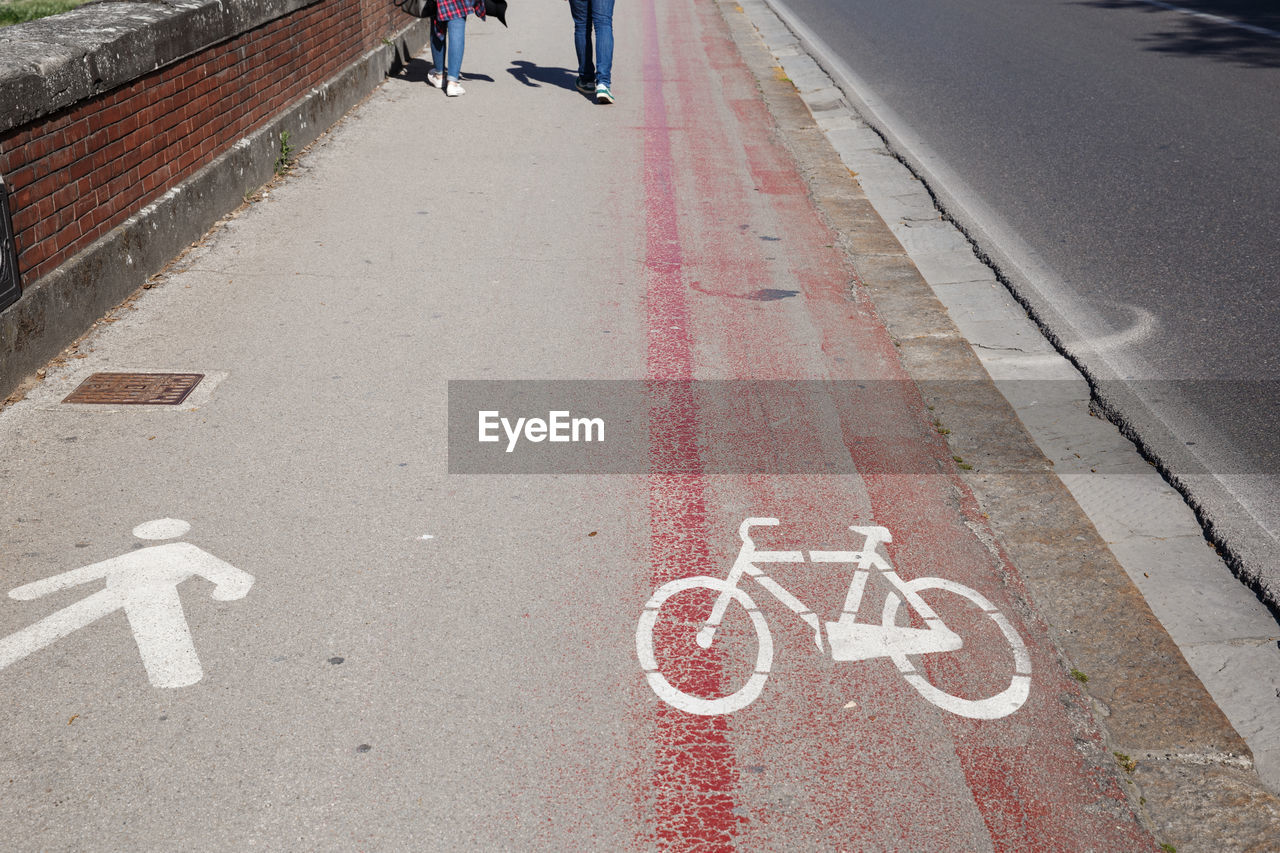High angle view of bicycle lane by footpath