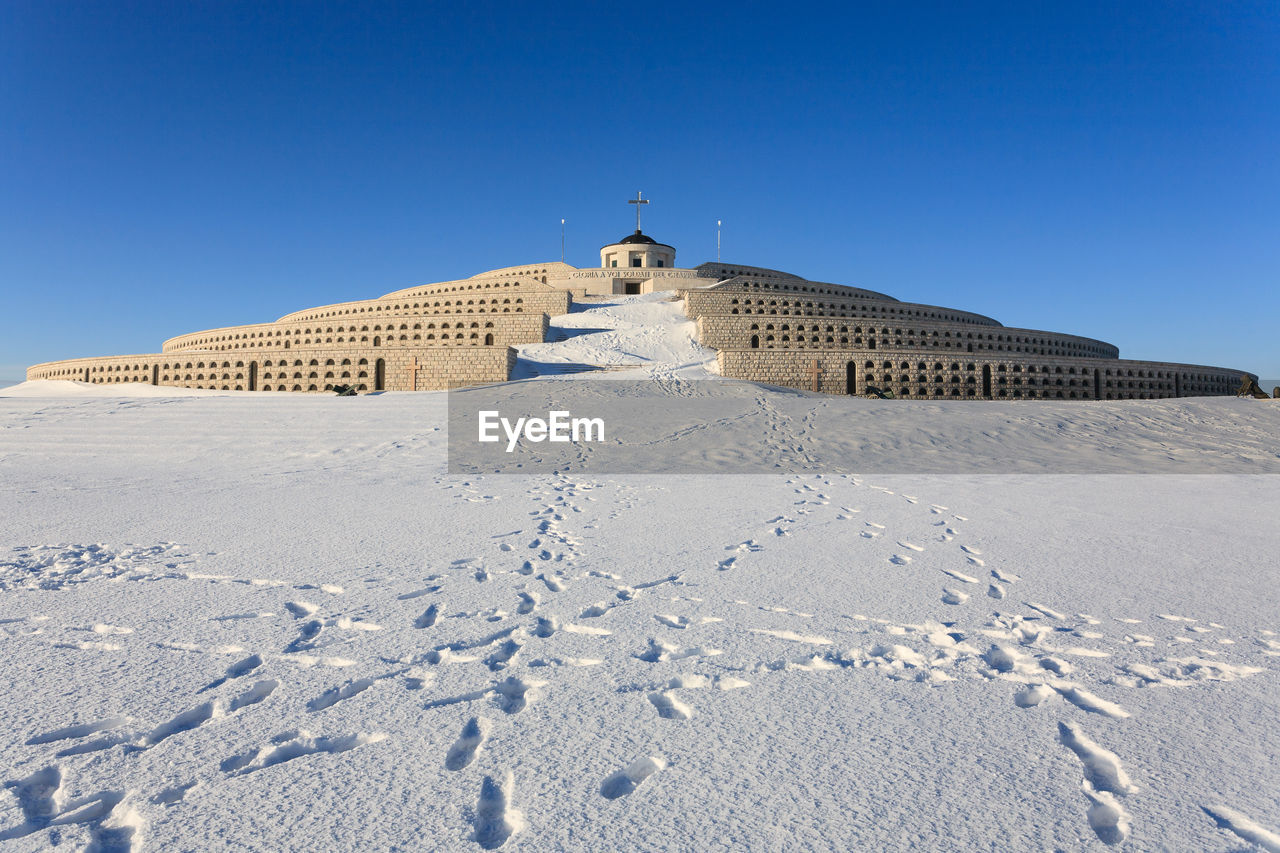 View of building against clear blue sky