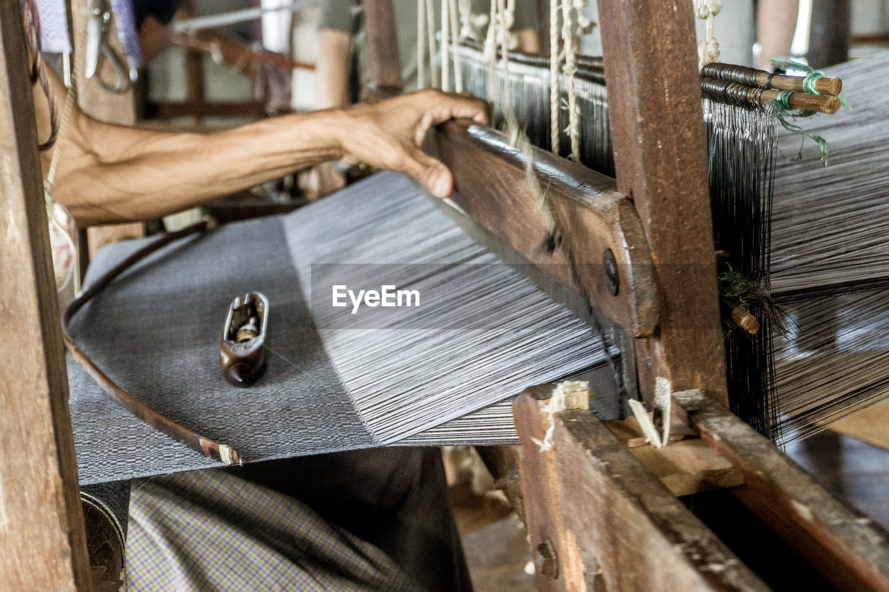 Low angle view of man working in factory