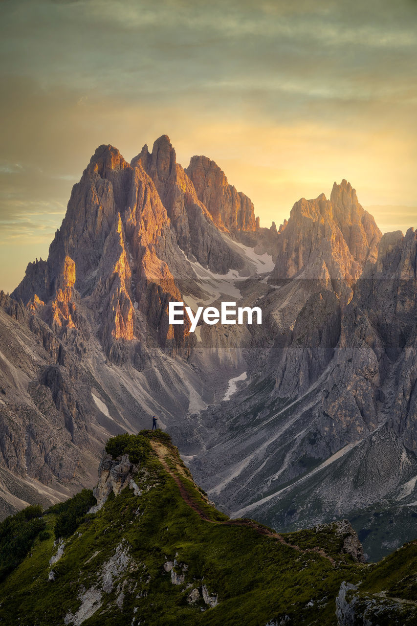 Scenic view of mountains against sky during sunset