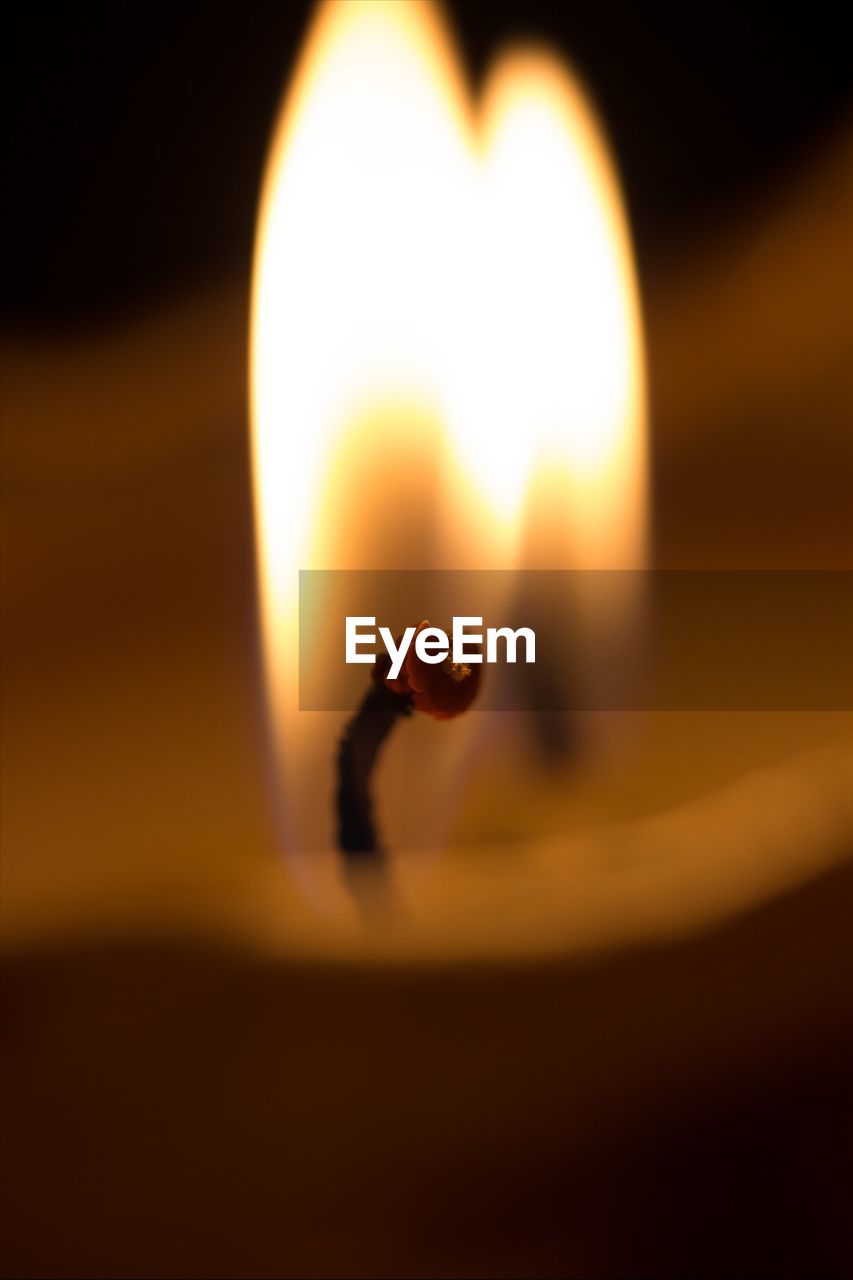 Macro shot of lit candles