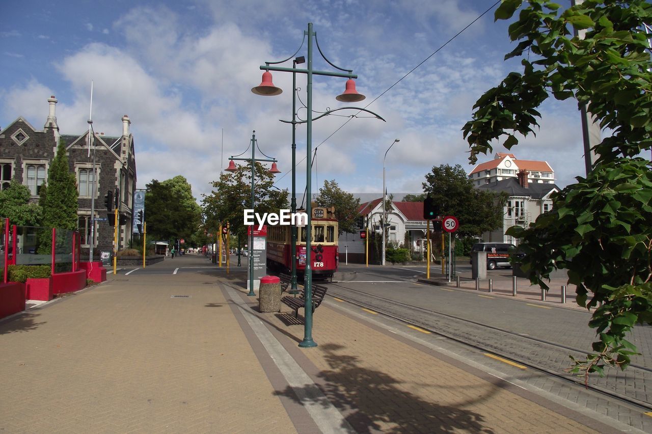 VIEW OF CITY STREET AGAINST SKY