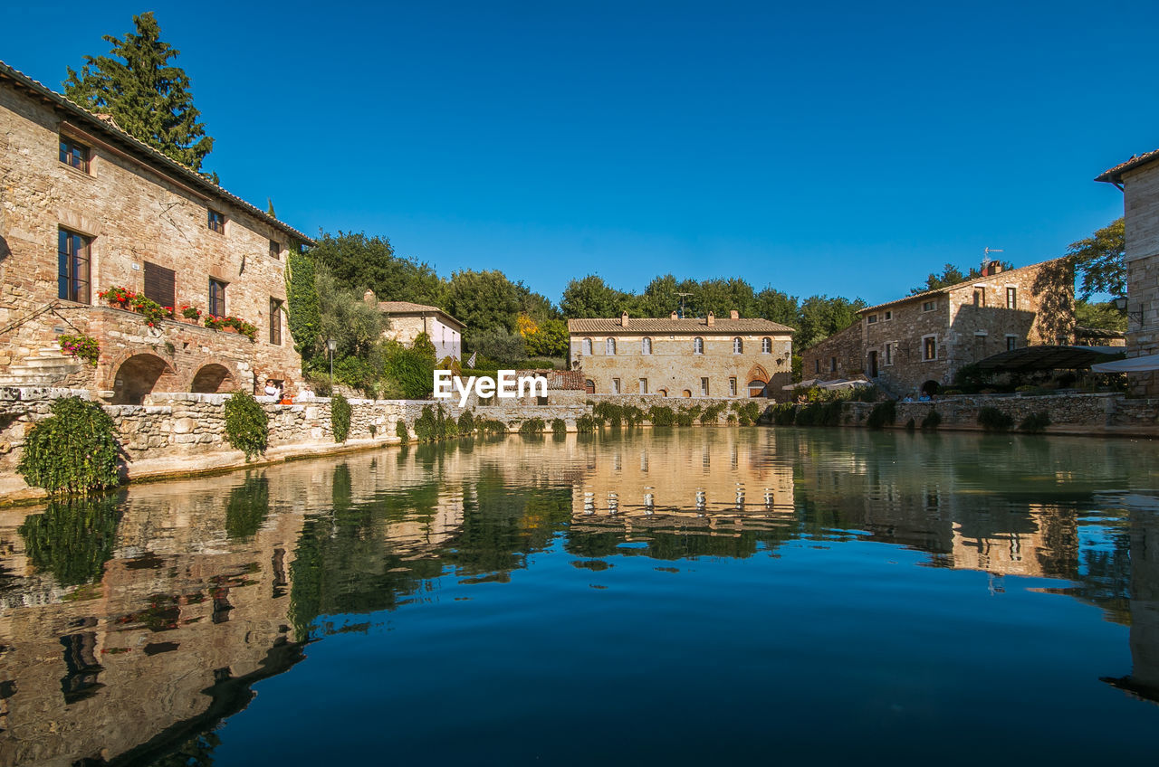 View of the medieval thermal baths in bagno vignoni a small village in val'd'orcia