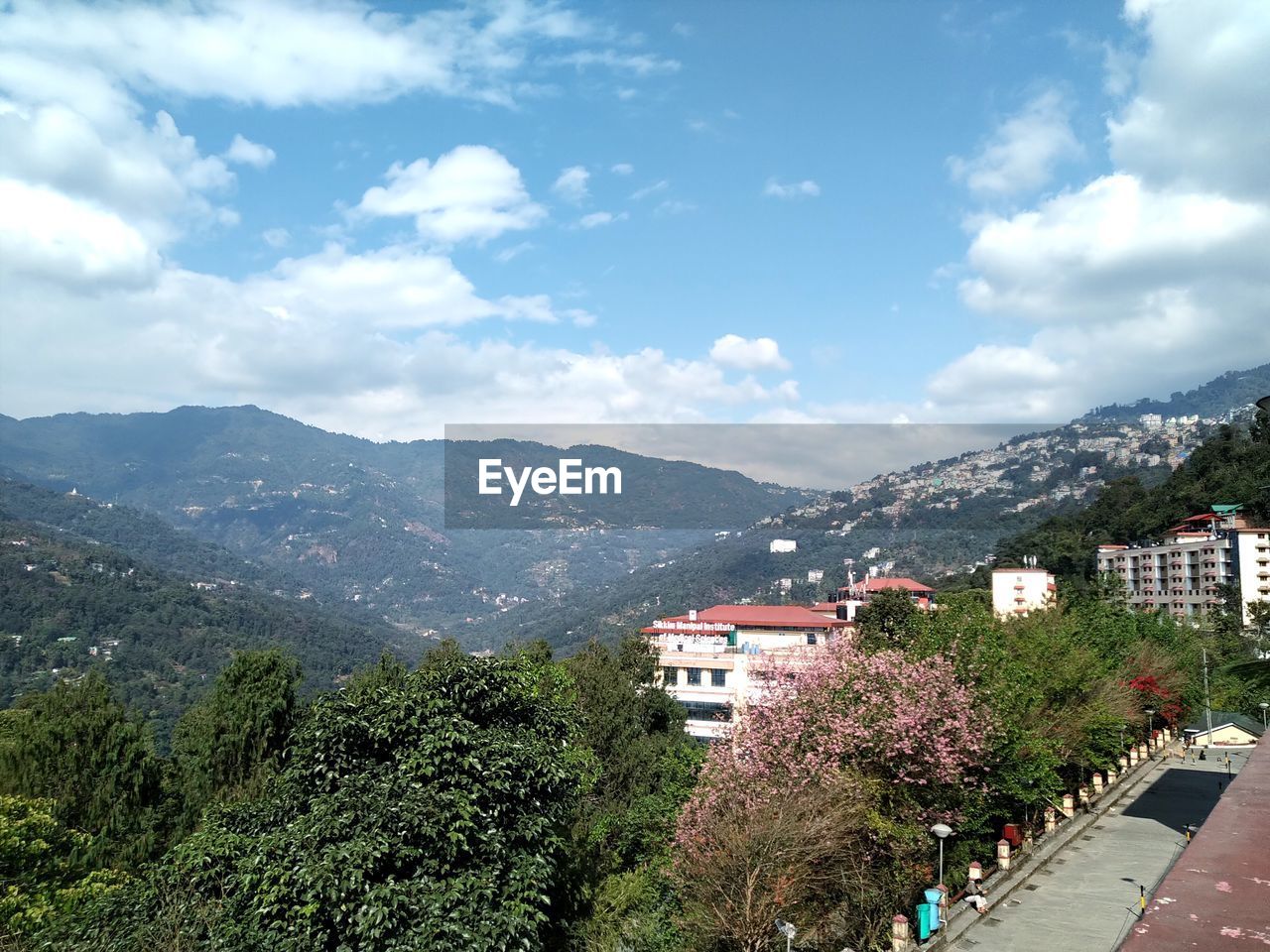 High angle view of buildings in city against sky