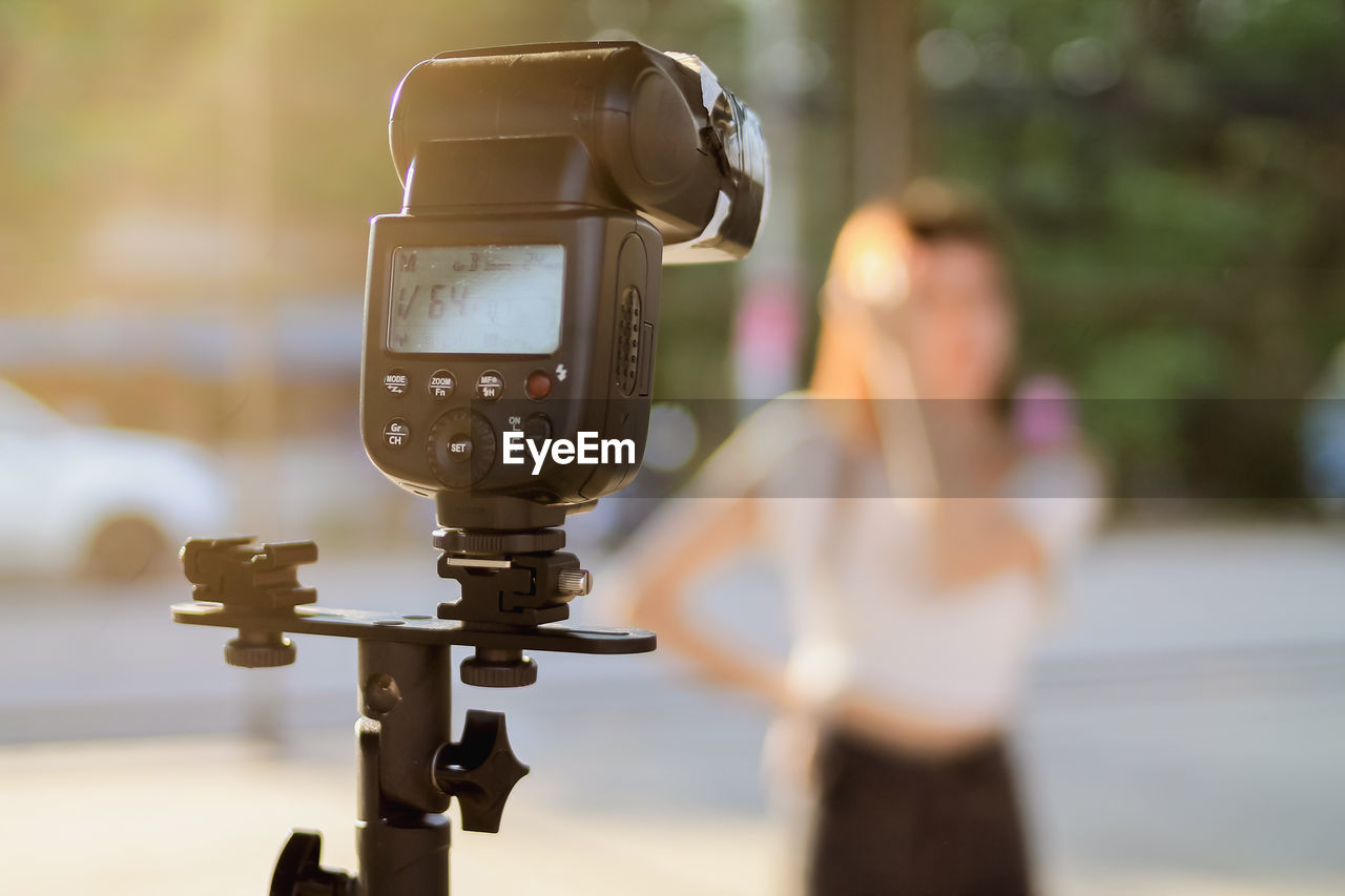 CLOSE-UP OF PERSON PHOTOGRAPHING ON CAMERA