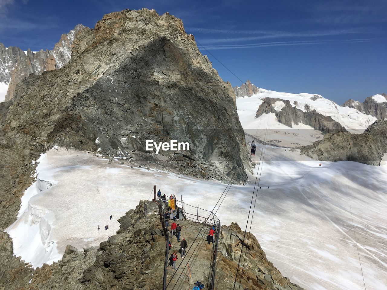 High angle view of people on snow covered mountain