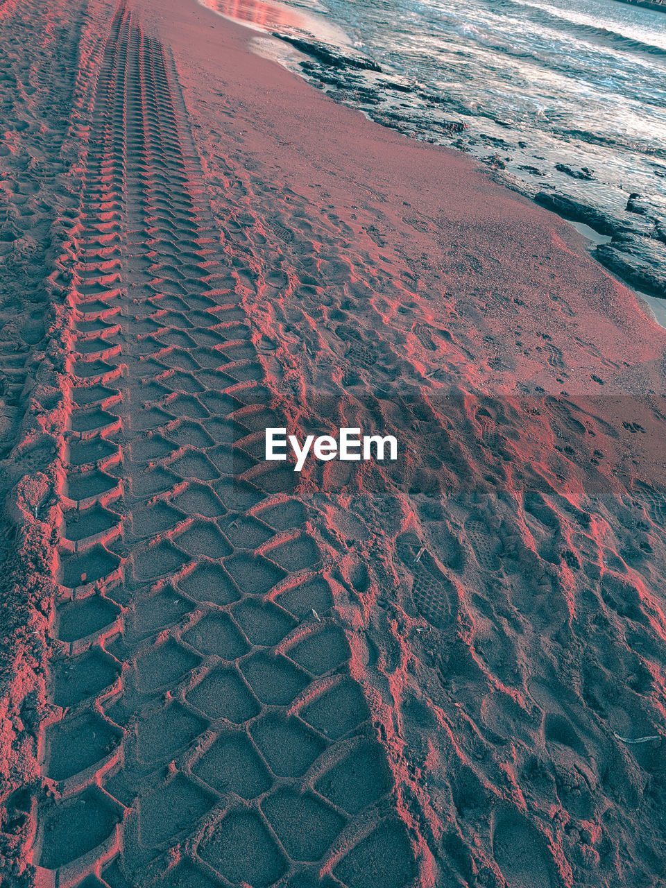 HIGH ANGLE VIEW OF LAND ON SNOW COVERED LANDSCAPE