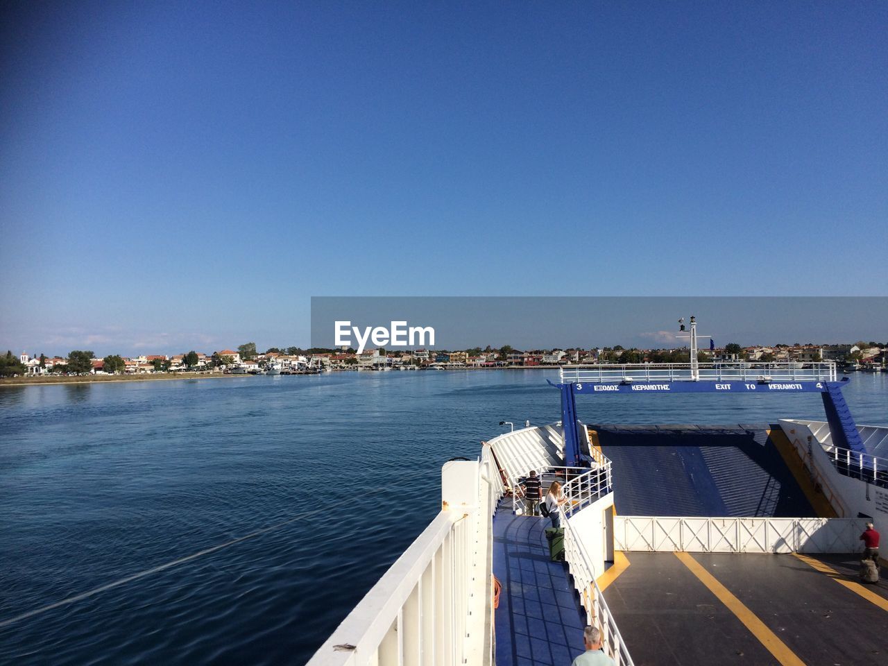 SEA AGAINST CLEAR BLUE SKY