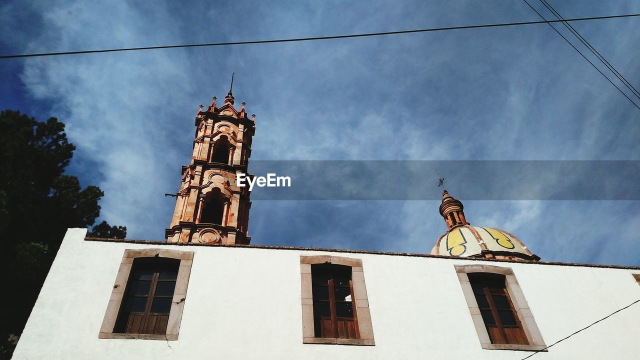 LOW ANGLE VIEW OF BELL TOWER