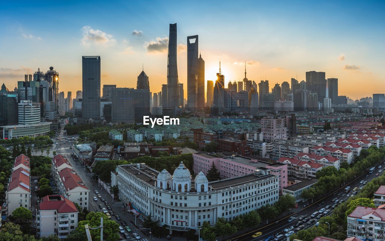 High angle view of cityscape against sky during sunset