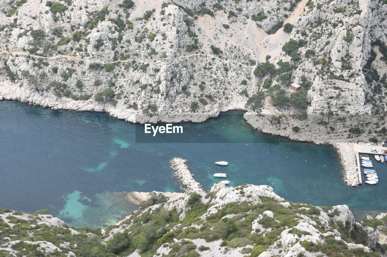 High angle view of rocks in sea