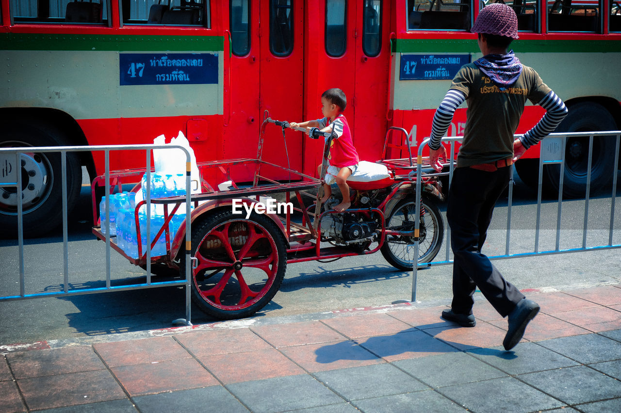 MAN WORKING ON STREET