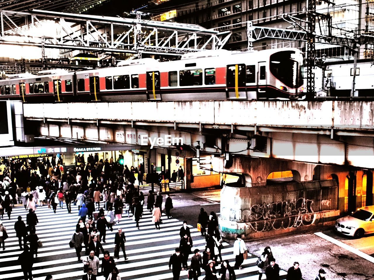 CROWD OF PEOPLE IN SHOPPING MALL