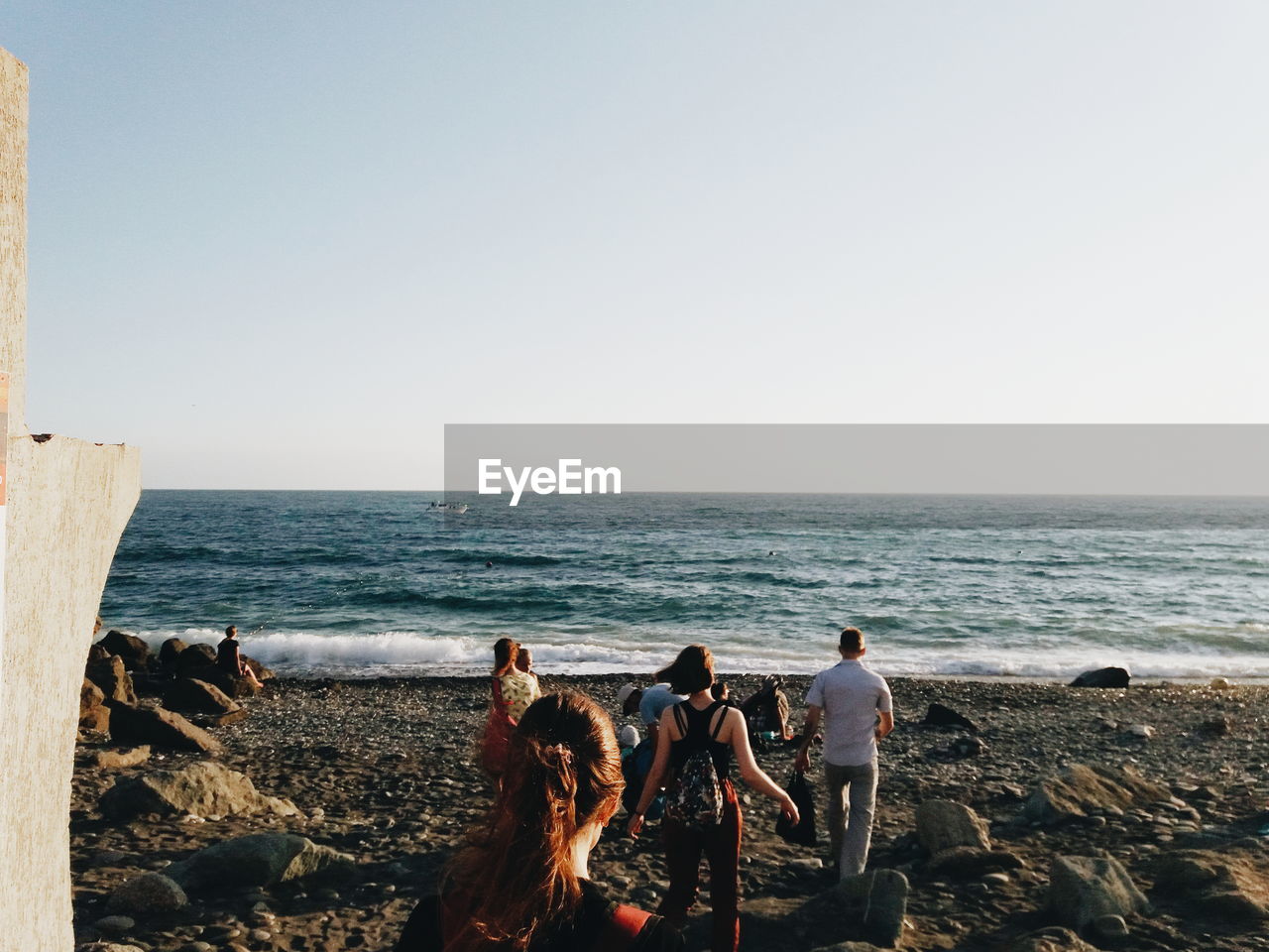 GROUP OF PEOPLE ON BEACH