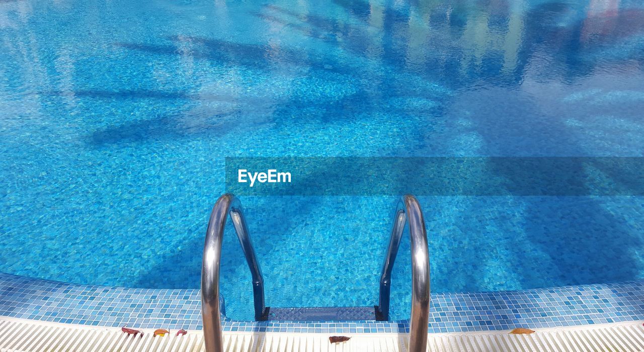 High angle view of railing at poolside