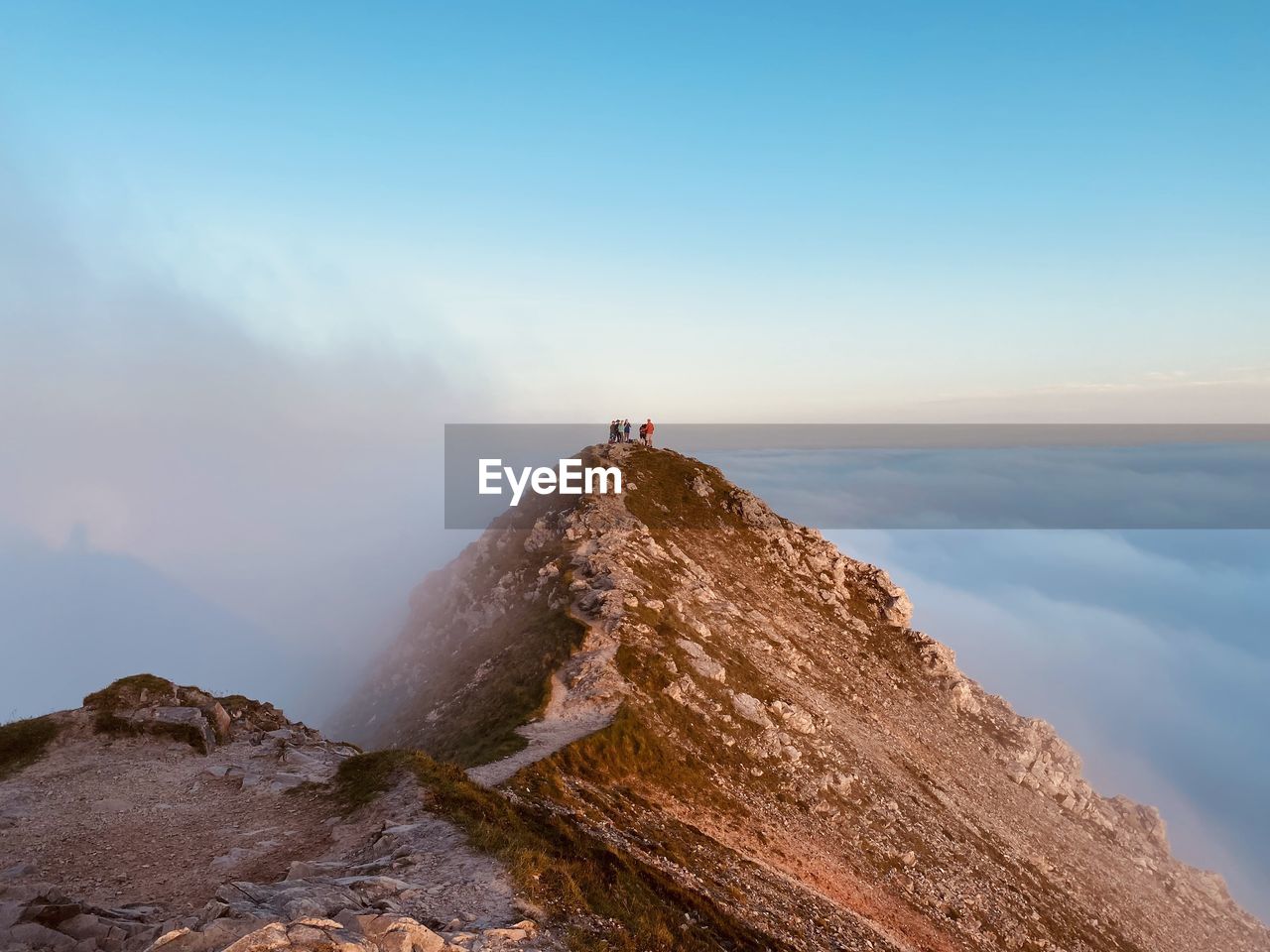 Rock formations on mountain against sky