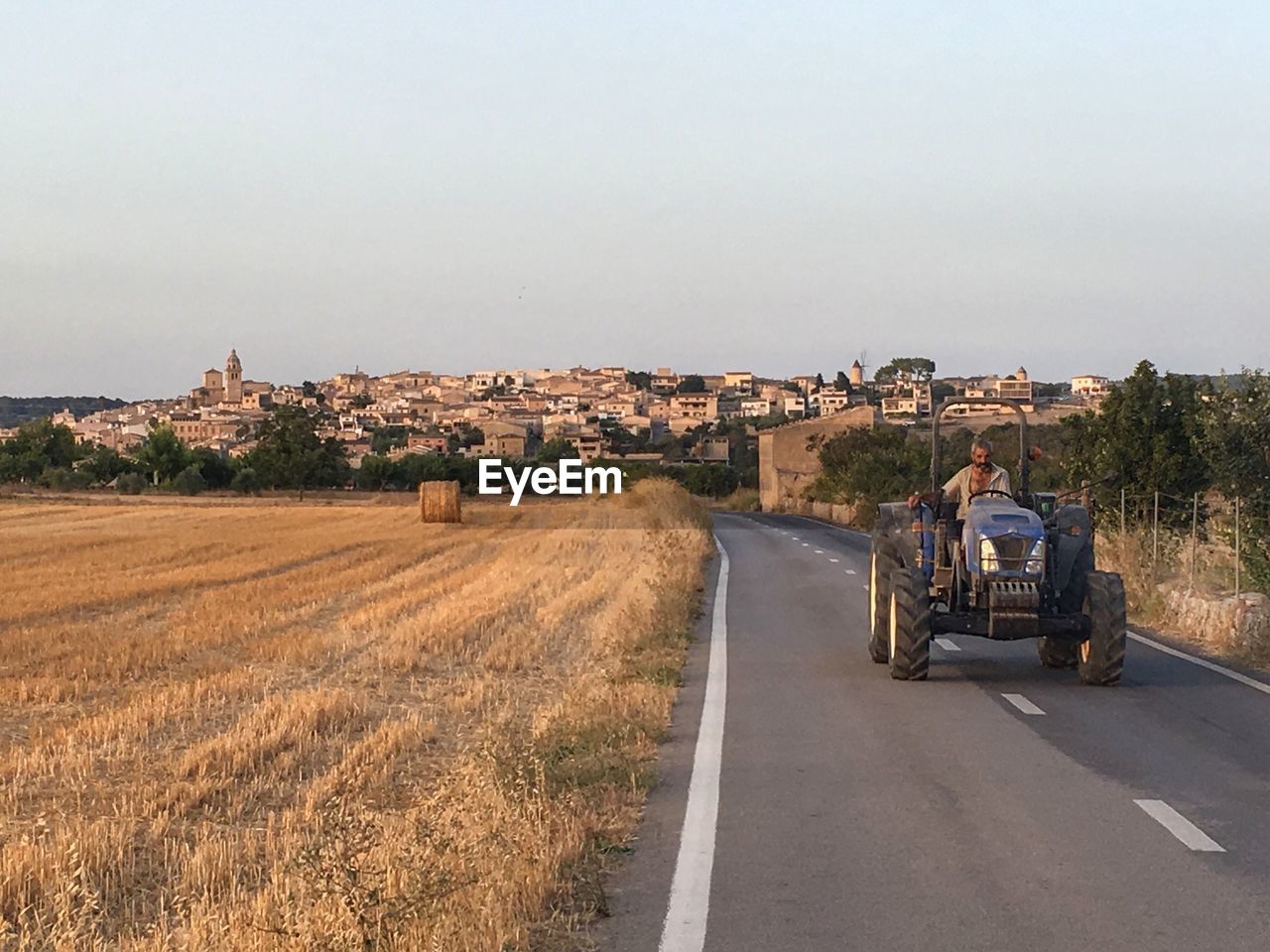 ROAD LEADING TOWARDS BUILDINGS