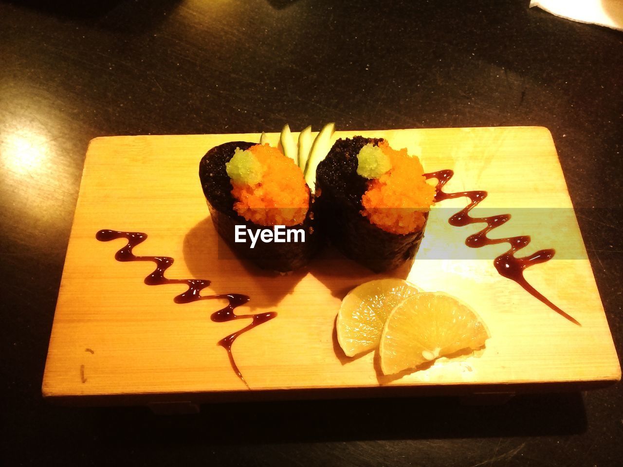 HIGH ANGLE VIEW OF CAKE ON TABLE