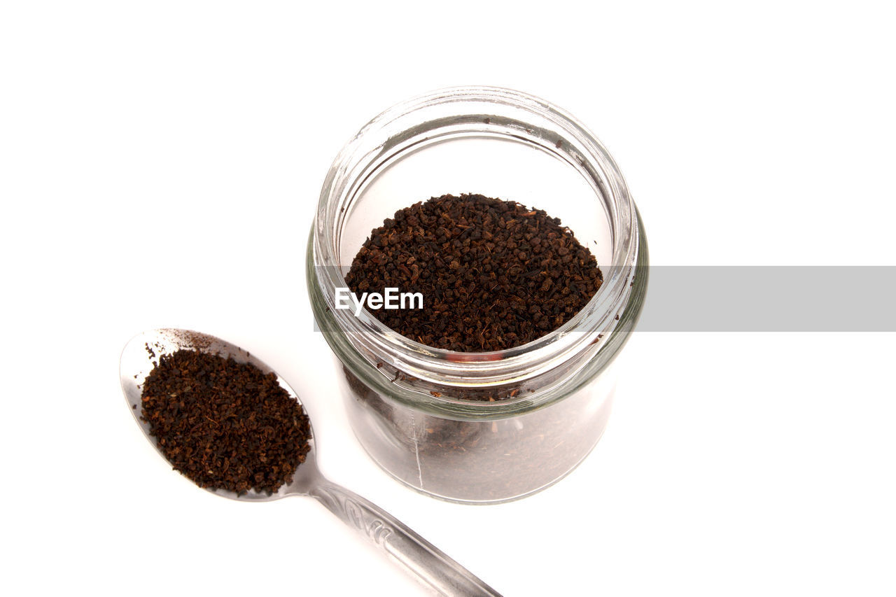 HIGH ANGLE VIEW OF COFFEE BEANS IN GLASS
