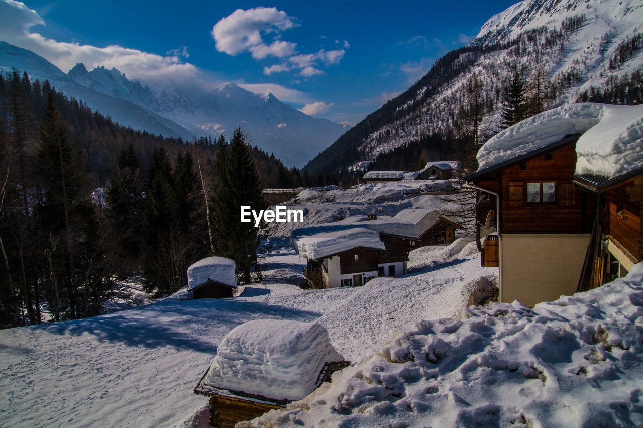 Scenic view of snowcapped mountains against sky