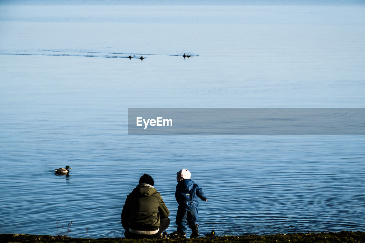 PEOPLE IN LAKE