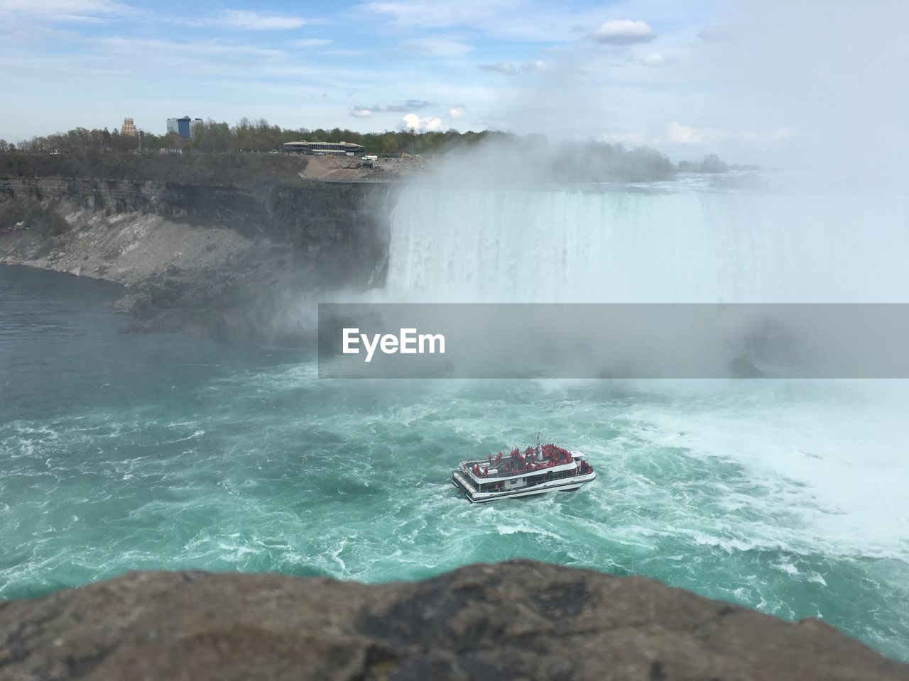 High angle view of boat in river at niagara falls