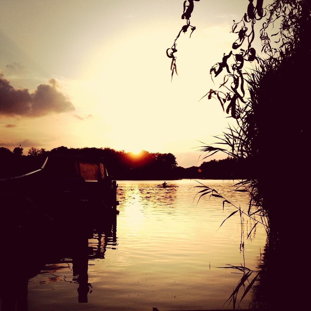 VIEW OF SUNSET OVER LAKE