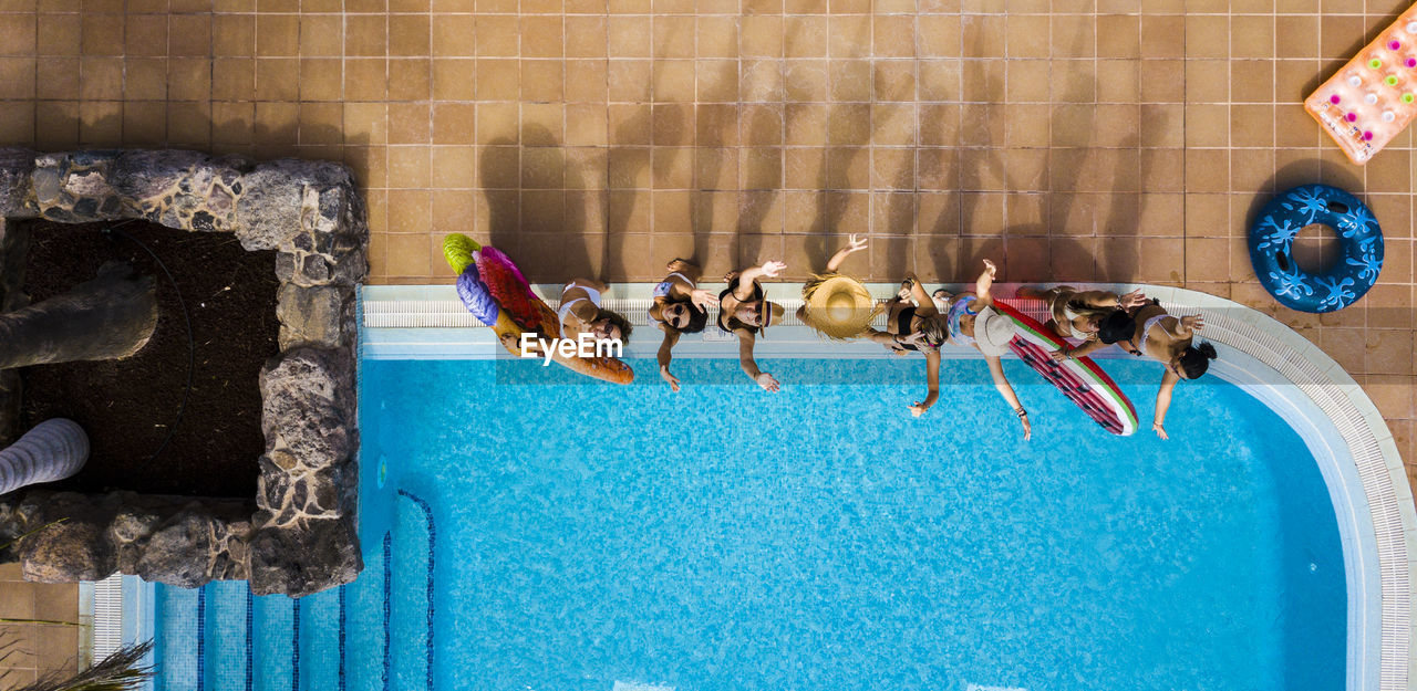 People swimming in pool