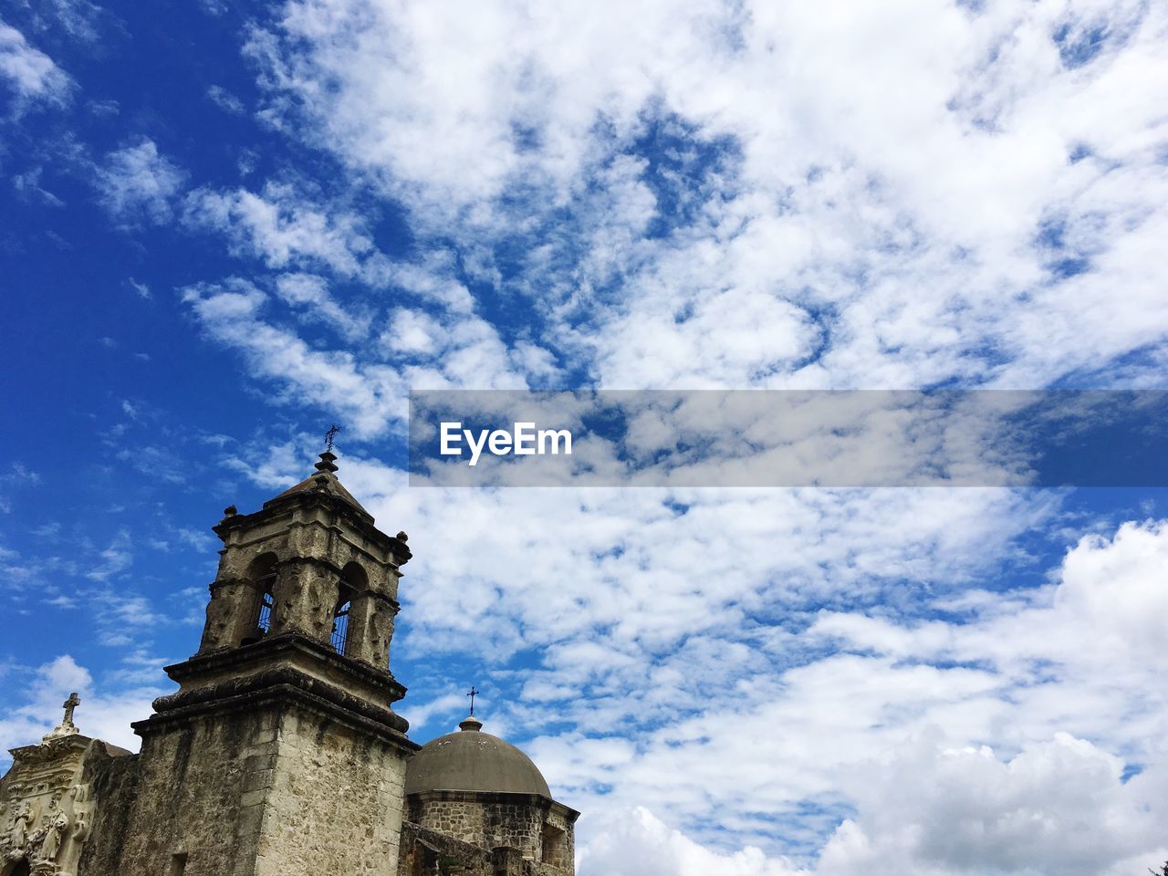 LOW ANGLE VIEW OF CLOCK TOWER