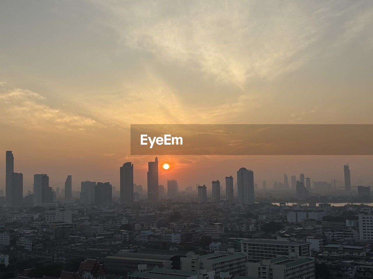 city, architecture, building exterior, built structure, sky, cityscape, building, landscape, urban skyline, skyscraper, office building exterior, horizon, sunset, skyline, residential district, nature, city life, cloud, dawn, travel destinations, downtown district, metropolitan area, no people, urban area, high angle view, metropolis, environment, outdoors, sunlight, business, development, fog, tower, dramatic sky, sun, evening, business finance and industry, travel, afterglow, aerial view, office