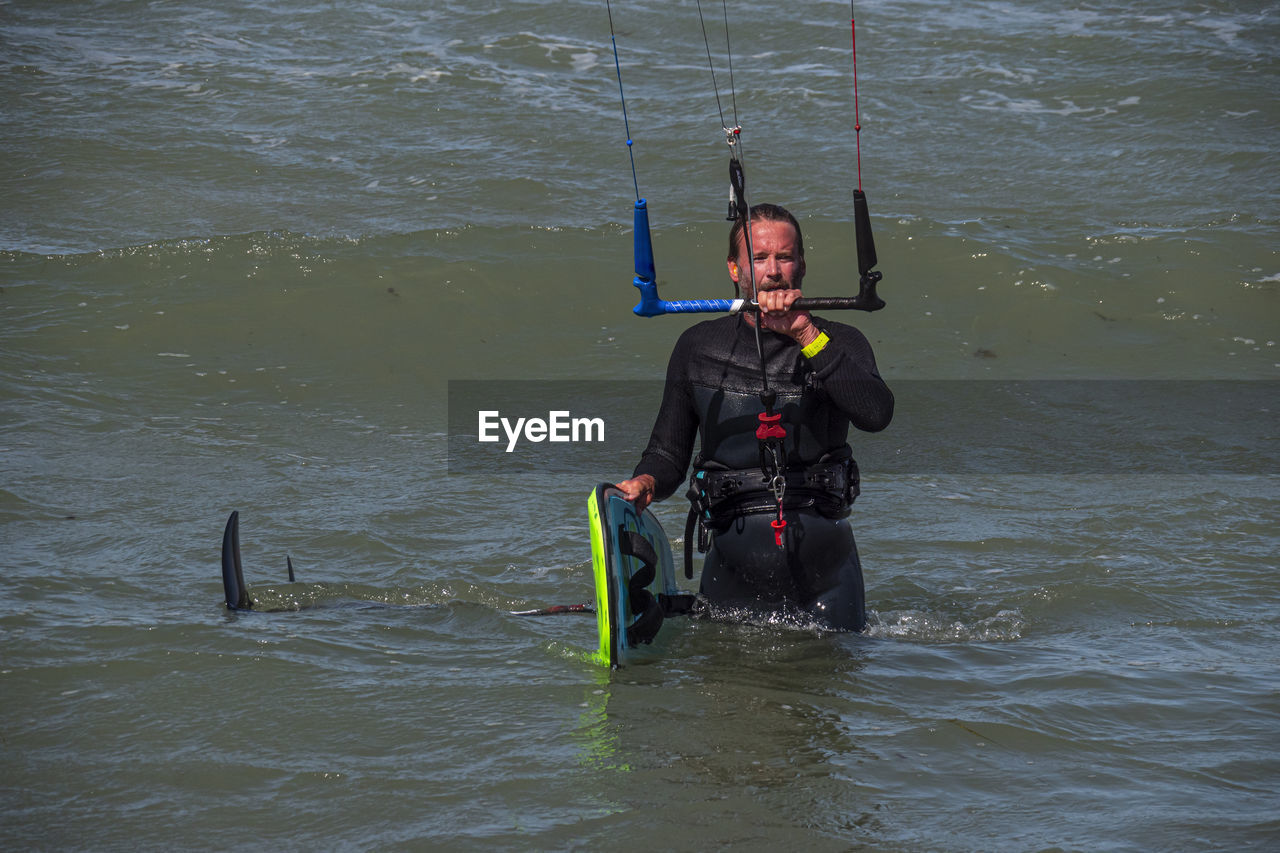 man scuba in lake