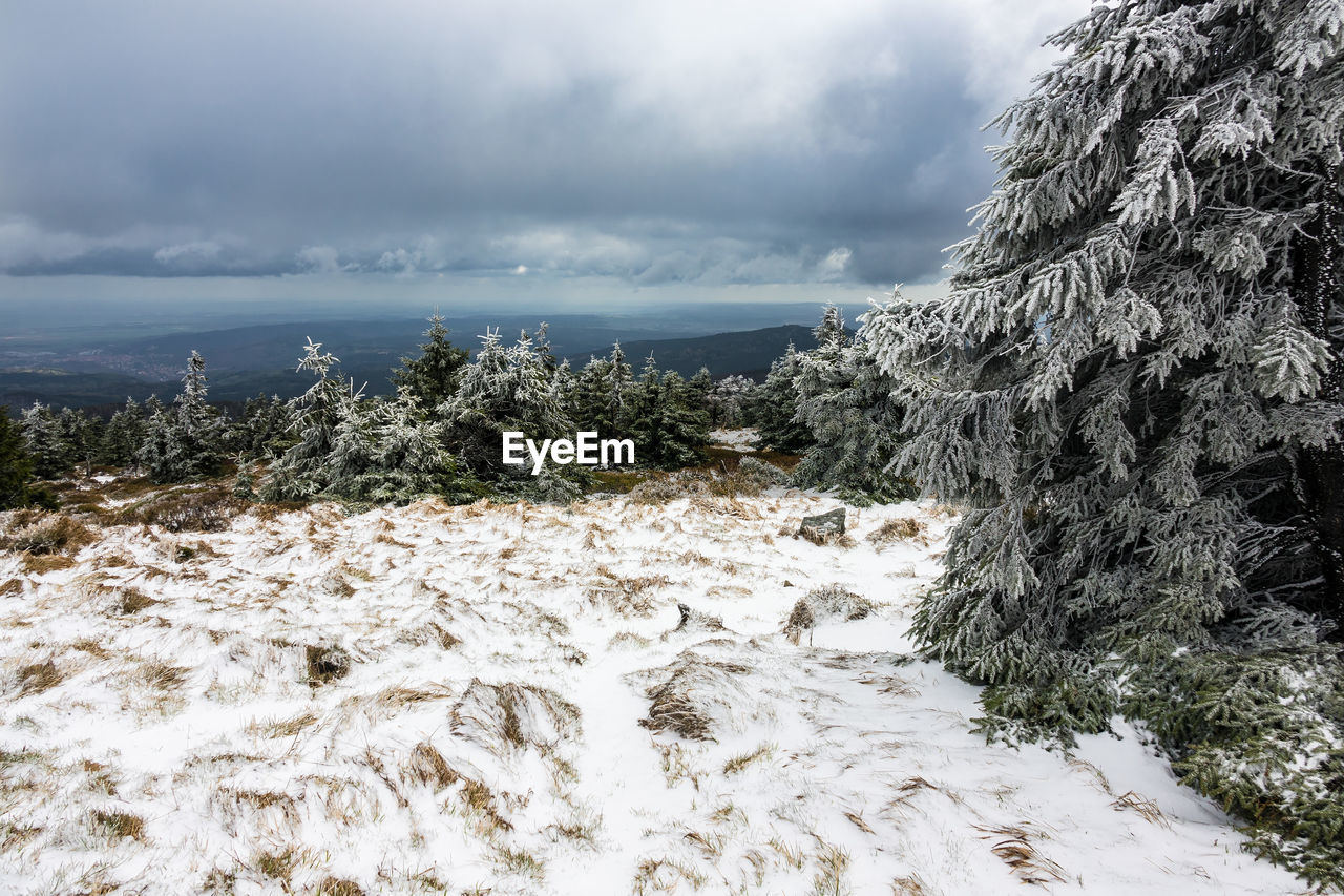 Scenic view of sea against sky during winter