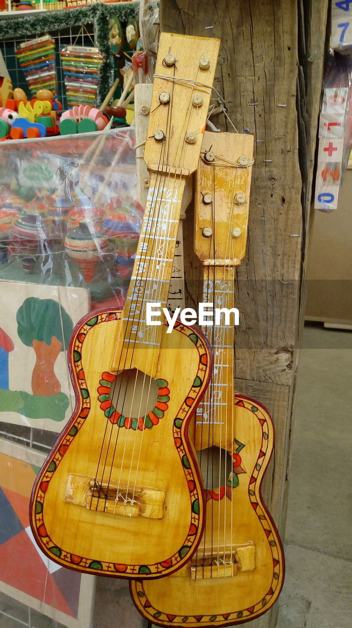 FULL FRAME SHOT OF GUITAR IN BATHROOM