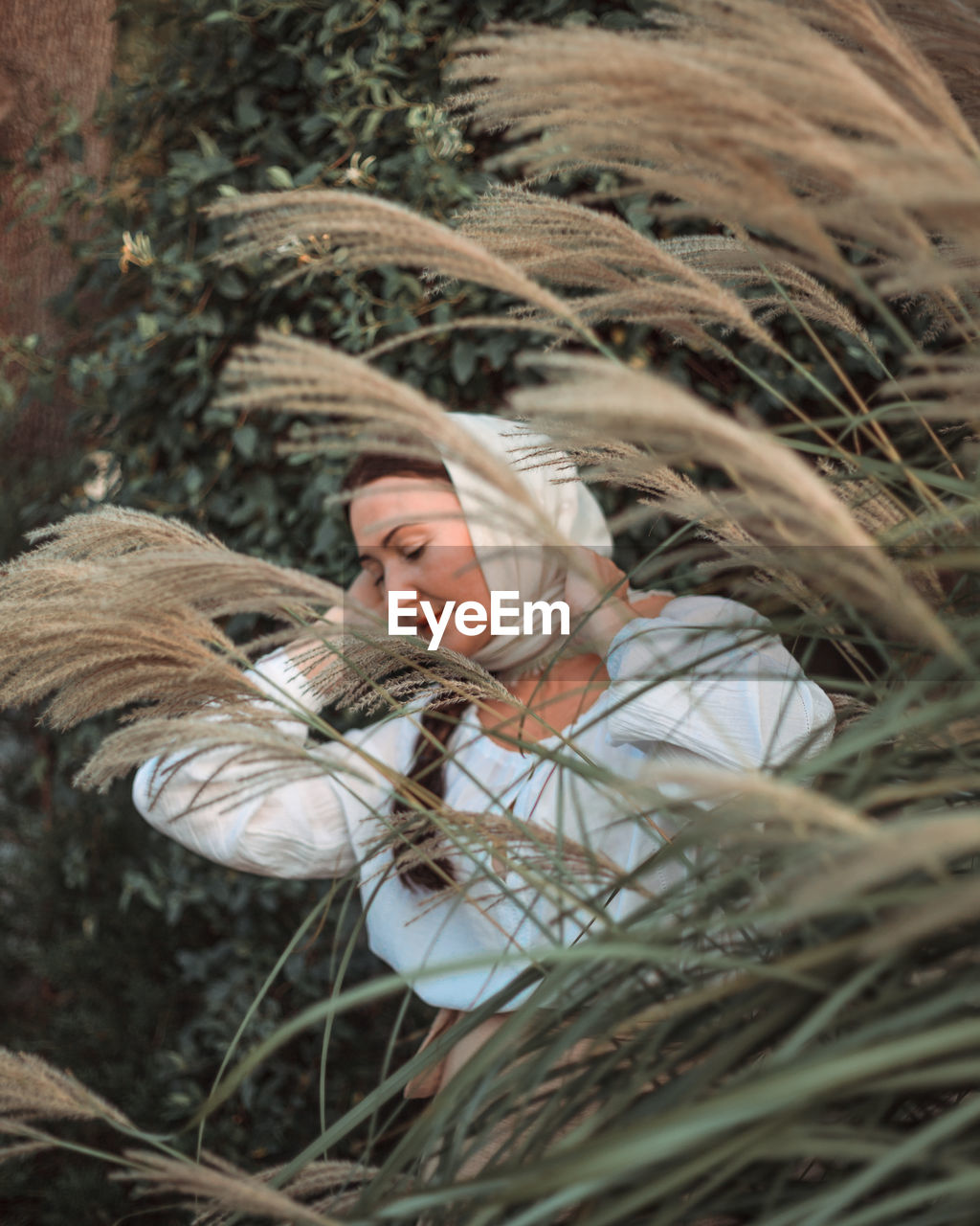 A village young peasant woman in folk slavic clothes. portrait of a ukrainian woman, a cossack.